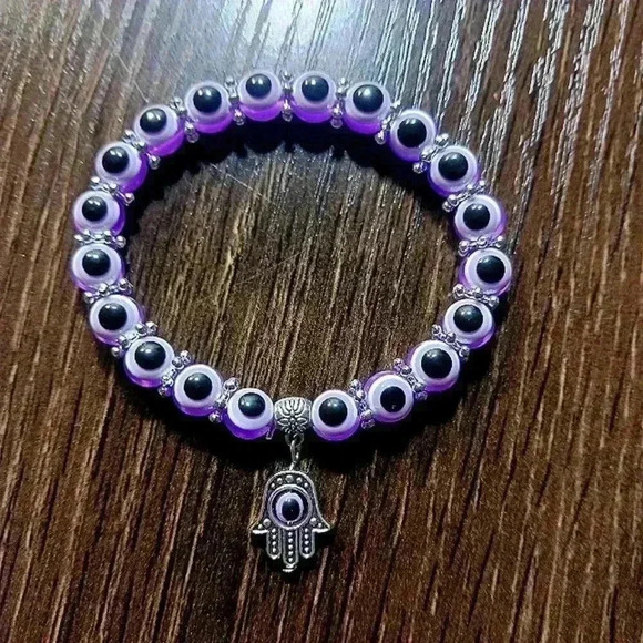 Purple eye watch with matching bracelet - Picture 8 of 9